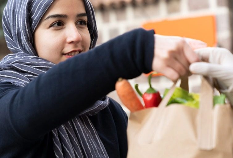 A moment of giving — a family receiving support with dignity